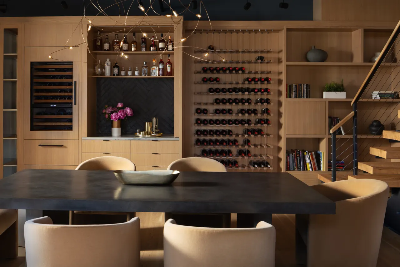 Built-in wine storage and bar in light wood
